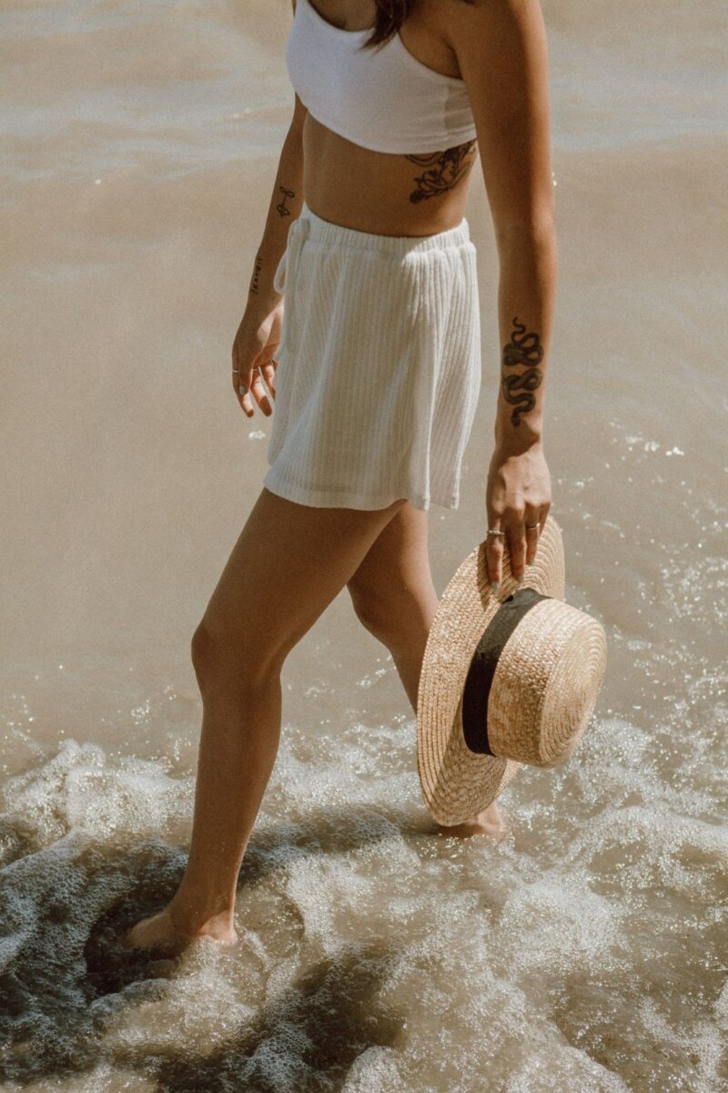 woman walking through water